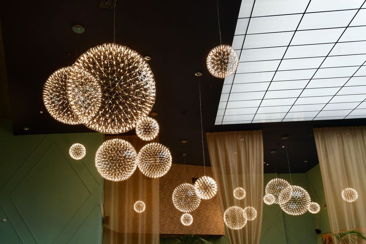 Modern decorative pendant chandeliers in upscale interior